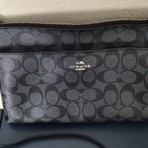 Like new Coach east west logo leather crossbody